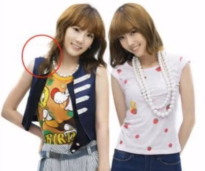 Bàn tay bí ẩn xuất hiện trên vai của Taeyeon.