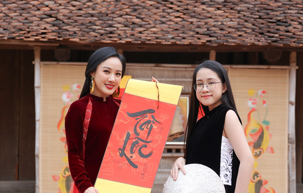 BTV Hoai Anh dua con gai xuat hien tren song truyen hinh