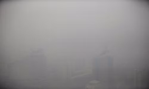 Tình trạng ô nhiễm không khí nghiêm trọng tại thủ đô Bắc Kinh, Trung Quốc. Ảnh chụp ngày 15/1/2015.