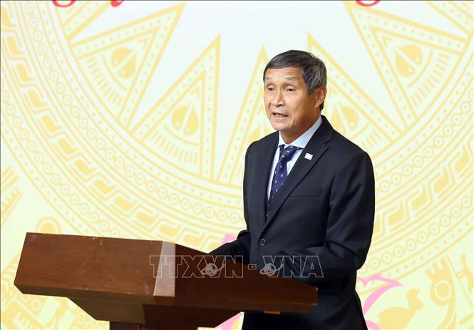 Huấn luyện viên Mai Đức Chung chia sẻ vinh dự và niềm vui của đội tuyển khi được Thủ tướng Phạm Minh Chính tiếp đón. Ông nhắc lại những khó khăn của tuyển nữ Việt Nam khi có nhiều cầu thủ bị mắc Covid-19 do lây từ đội bạn. (Ảnh: TTXVN).