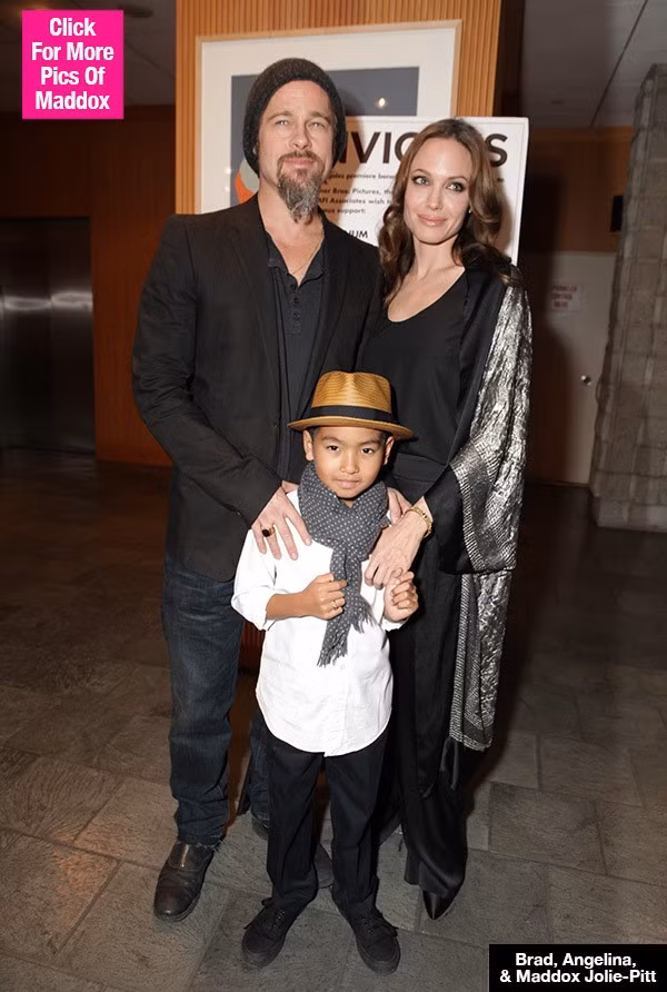 Brad Pitt và Angelina Jolie hạnh phúc bên con trai cả Maddox. Ảnh: Hollywood Life.