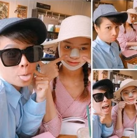 Kiều Ngân vẫn vô tư tạo dáng trước ống kính, mặc cho băng keo chi chít trên mặt.