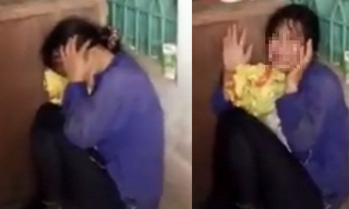 Thuc hu chuyen nguoi phu nu mac rach ruoi bat coc tre em