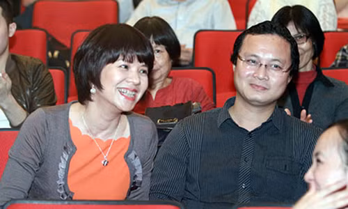 MC Diễm Quỳnh và chồng.