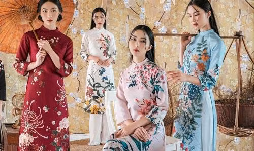 Áo dài cách tân từ lụa, gấm đơn giản Với chất liệu từ lụa, gấm sẽ mang lại sự ấm áp và sang trọng cho cô nàng, đặc biệt là những cô nàng yêu thích sự ấm áp. Đây là hai loại chất liệu thông dụng nhất để may áo dài và áo dài cách tân trong thời gian gần đây. Năm nay, những mẫu áo dài cách tâm làm từ gấm được thêu hoa ấn tượng, không theo lối họa tiết trang trí cổ điển thông thường, rất được các chị em yêu thích, mặc dù chúng có giá thành cao, khoảng 2 - 3 triệu mỗi bộ.