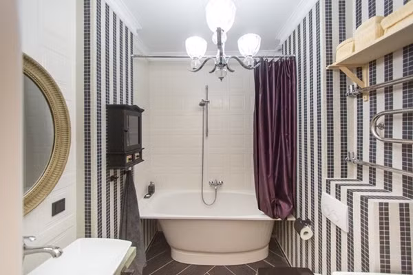 Phòng tắm Không gian phòng tắm được thiết kế với những mảng màu đối lập tạo nét cá tính và sinh động cho góc nhỏ.