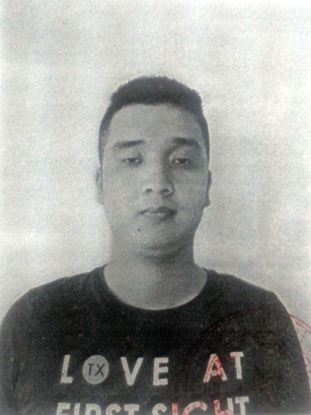 Đặng Công Duy Thiện tại cơ quan điều tra.