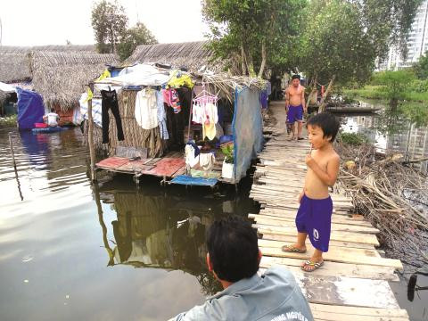 Xóm Vườn Ổi tập trung gần 100 hộ nhập cư bất hợp pháp. - Ảnh: P. Huy