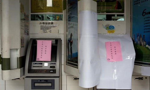 2,2 triệu USD đã bị cướp từ hệ thống ATM của ngân hàng First Bank, Đài Loan. Ảnh: Reuters.