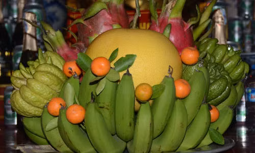 Nhung qua nen va khong nen dat tren ban tho ngay Tet