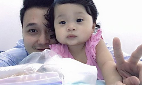 Quang Vinh chia sẻ hình ảnh của một bé gái bụ bẫm, đáng yêu.