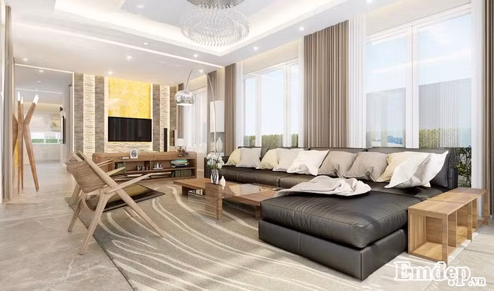 Thảm trải sàn cùng tông màu với rèm tạo sự đồng nhất trong màu sắc. Phòng khách toát lên sự sang trọng, hiện đại mà ấm áp.