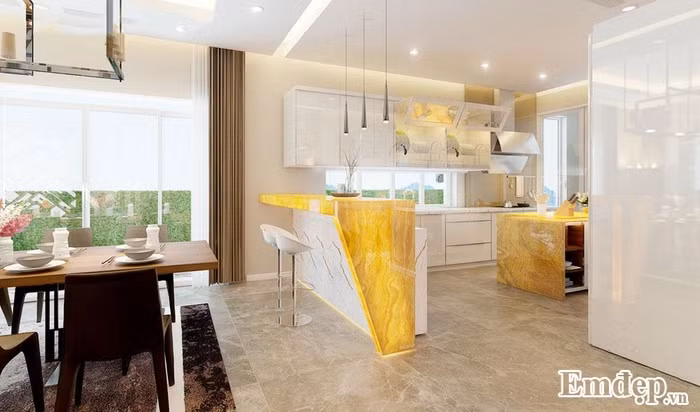 Phòng bếp Phòng bếp được thiết kế như quầy bar với tông màu vàng, trắng là chủ đạo tạo sự ấm áp.