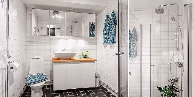 Không gian phòng tắm Phòng tắm được giữ gam màu chủ đạo của toàn bộ không gian đó là màu trắng, chỉ thêm pha một chút sắc màu từ gạch lát sàn và vật dụng cần thiết hàng ngày giúp căn phòng tuy nhỏ nhưng nhìn tổng thể như được 'ăn gian' về diện tích một cách ngoạn mục. Chỉ khoảng vài mét vuông nhưng gia chủ đã khá tinh tế trong việc lắp đặt gương tăng ánh sáng cũng như diện tích sử dụng cho không gian.