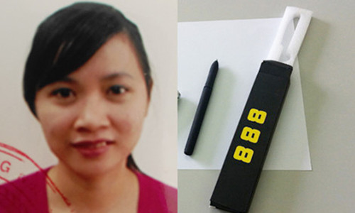 Nguyễn Thị Tuyết Nga và chiếc bút "phù thủy" - Ảnh: báo Pháp luật TP. HCM