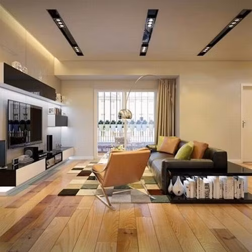 Phòng khách được bài trí đơn giản nhưng không kém phần hiện đại. Cửa sổ đúng hướng hút ánh sáng tự nhiên.