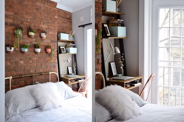 Cửa sổ rộng cung cấp nguồn sáng đem lại cảm giác thoáng rộng, chậu cây nhỏ treo tường tăng thêm không gian xanh cho căn phòng.