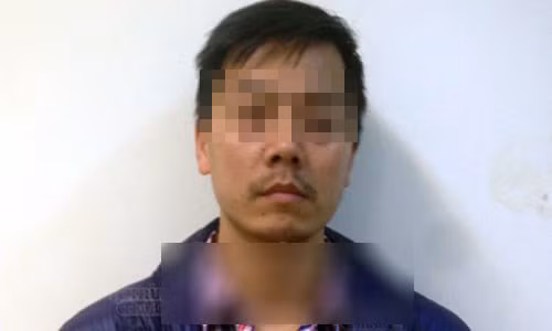 Đối tượng Cao Mạnh Hùng tại Cơ quan điều tra, chiều 16/3.