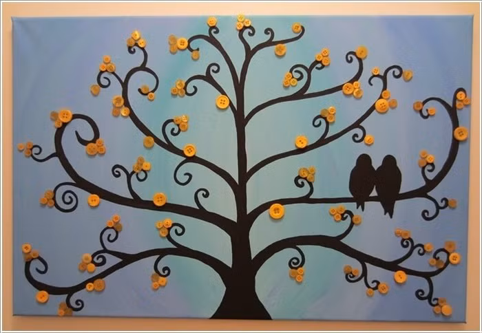 2. Tạo cây sinh động trên tường Với cách vẽ sơn thành hình cây trên tường, tất cả đều dùng chất liệu sơn đôi khi sẽ khiến không gian thêm mờ nhạt và na ná giống với những căn phòng khác. Hãy tạo nét khác biệt từ việc trang trí bằng cách sử dụng cúc áo để tạo hình những bông hoa xinh xinh, nổi bật trên tường.