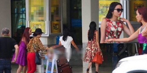 Cô thản nhiên để mẹ xách đồ còn mình đi một mình.