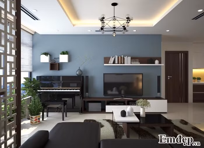 Mọi chi tiết trong phòng khách đều thiết kế tinh tế. Kệ tường KTS khéo léo đặt những chậu hoa tạo không gian xanh trong căn hộ.