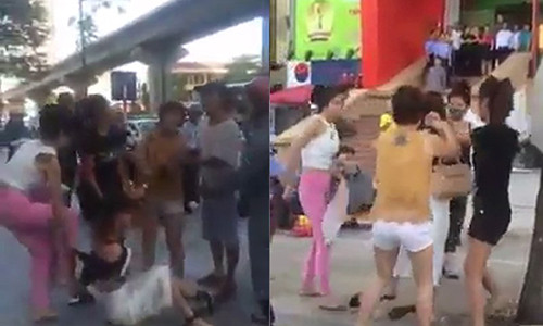 Chị M. bị nhóm phụ nữ đánh đập, giật áo giữa đám đông.