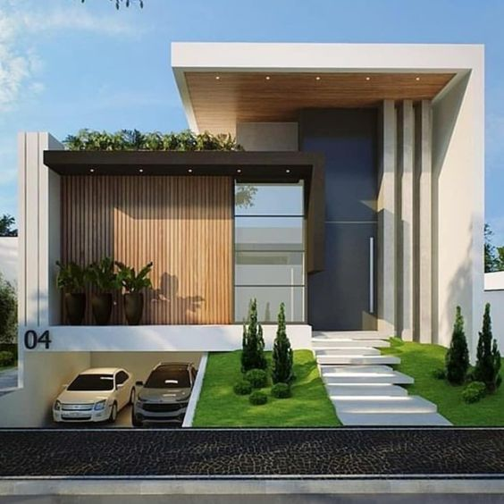 Nhà 1 tầng tận dụng tầng trệt làm hầm để xe, phần lửng lát thêm cỏ và đá làm bậc thang. Ảnh: Xaydungso.