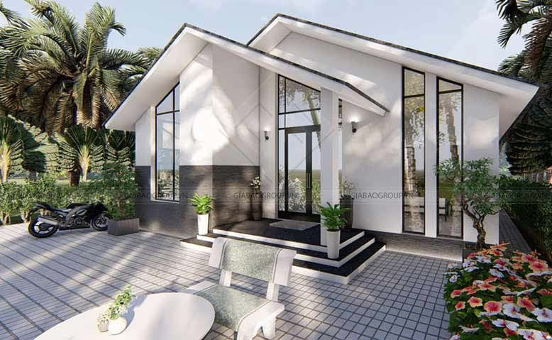 Hướng đến phong cách hiện đại và sang trọng nên kiến trúc sư bố trí cửa kính xuyên suốt từ trên xuống dưới sàn nhà. Các chậu cây cảnh giúp tạo nét sinh động cho ngôi nhà. Ảnh: Giabaogroup.