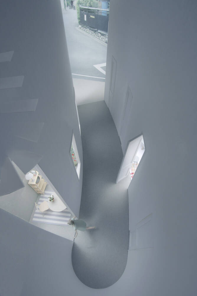 Điểm đặc biệt của ngôi nhà còn nằm ở thiết kế có một không hai. Không phải là những bức tường vuông vức, sắc gọn, công trình trải dài thành một đường cong mềm mại giúp xua tan đi cảm giác chật chội và bí bách.