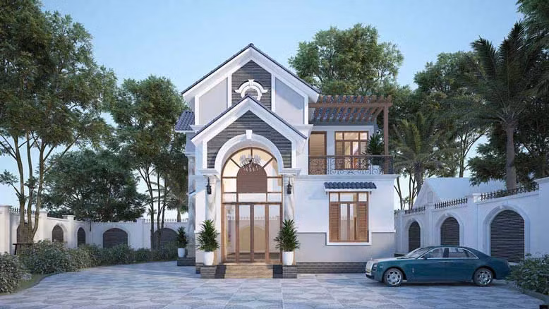 Với thiết kế dạng vòm, mang hơi hướng cổ điển, phần mái hiên che tạo ra điểm nhấn nhấn sinh động và thu hút cho căn nhà mái thái. Ảnh: Giabaogroup.