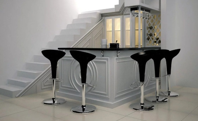 Quầy bar xinh xắn không chỉ giúp nhà bạn đẹp hơn mà còn tạo ra một góc giải trí cho gia đình. Nguồn ảnh: Housebeautiful