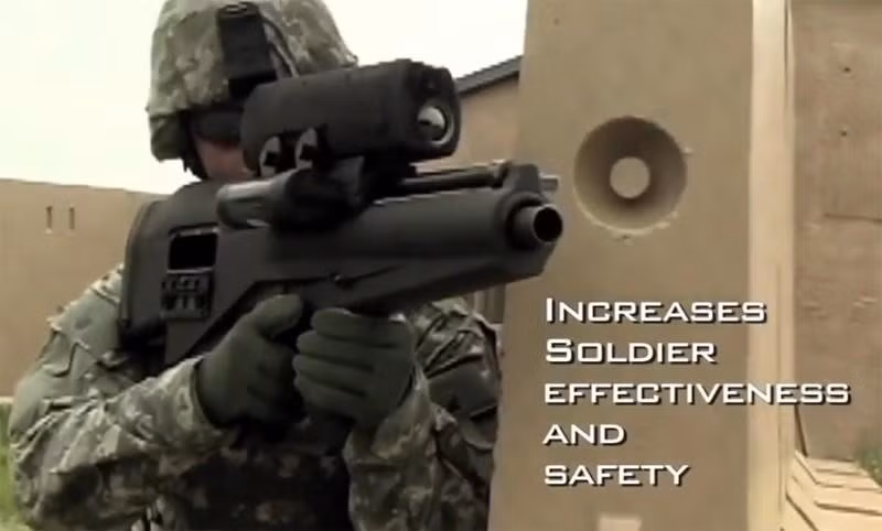 Đây là loại súng được vi tính hoá với ống ngắm công nghệ cao và đạn lập trình sẵn. Khi viên đạn bắn ra chúng sẽ bay theo quỹ đạo định trước và lao tới trước đầu mục tiêu.