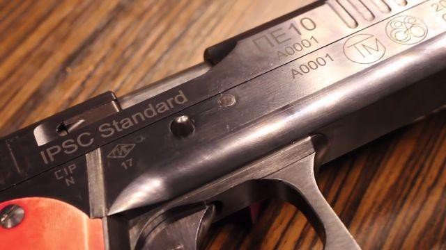 Khẩu súng được sản xuất bởi công ty Souz TM, mới thành lập năm 2016. Theo nhà sản xuất, nó được thiết kế phục vụ các cuộc thi bắn súng thực tế.