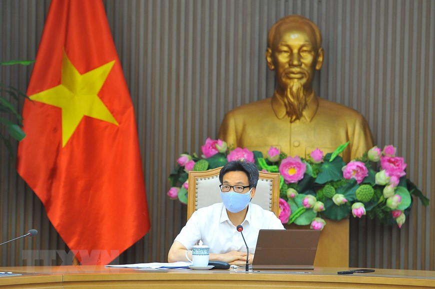 Phó Thủ tướng Chính phủ Vũ Đức Đam, Trưởng Ban Chỉ đạo Quốc gia phòng, chống dịch COVID-19 chủ trì cuộc họp. (Ảnh: Minh Đức/TTXVN)