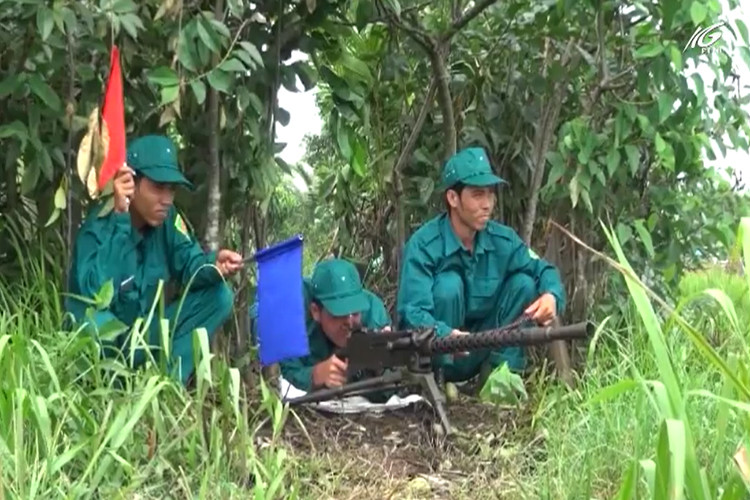 Trong ảnh là lực lượng Dân quân Tự vệ với súng máy M1919 Browning trong diễn tập khu vực phòng thủ 2018. Nguồn ảnh: THKG.