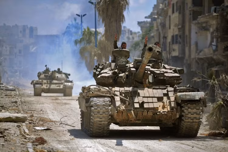 Sau tuyên bố của RT, Hãng Thông tấn nhà nước Syria (SANA) phủ nhận bất kỳ thỏa thuận nào giữa quân đội Syria và IS trong các quận ngoại ô miền nam Damascus. Nhưng SANA không đưa ra bình luận nào về việc ngừng bắn tạm thời. Ảnh: Middle East Eye.