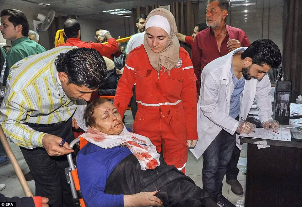 Hinh anh dau long nghi an tan cong hoa hoc o Douma-Hinh-9