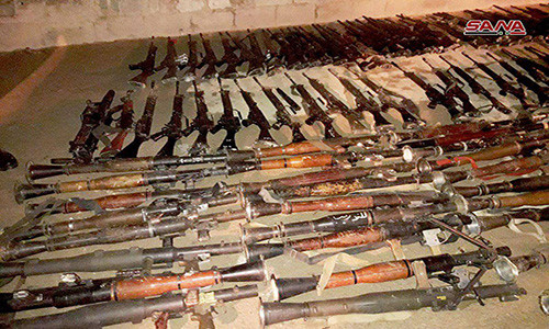 “Số vũ khí mà nhóm Jaysh Al-Islam giao nộp cho chính phủ Damascus gồm có súng phản lực chống tăng RPG và tên lửa,...”, nguồn tin cho biết. Ảnh: SANA.