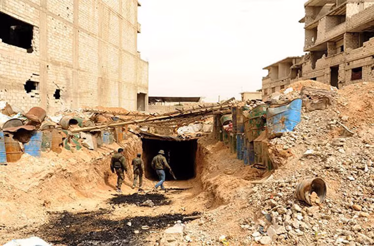 Còn tại Damascus, Quân đội Syria đã phát hiện thêm một đường hầm dài 7 km của nhóm phiến quân ở thị trấn Ein Terma, Đông Ghouta. Ảnh: FNA.