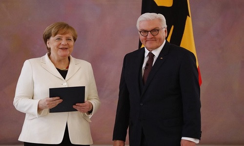 Thủ tướng Angela Merkel và Tổng thống Frank-Walter Steinmeier. Ảnh: Reuters.