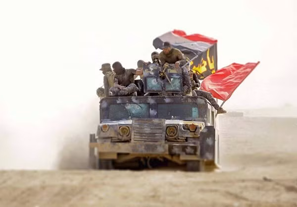 Dan chung Iraq dua nhau tro ve nha sau giai phong