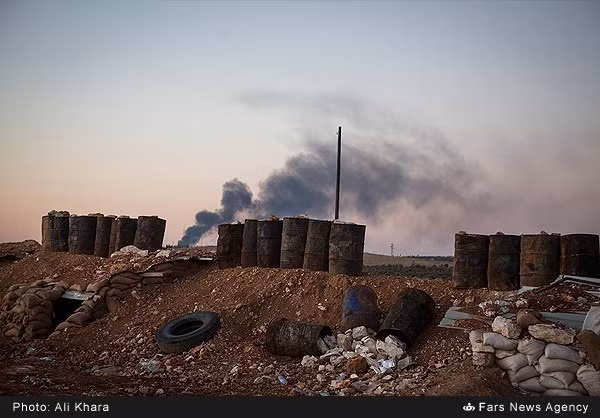 Khói bốc lên ở khu vực xảy ra cuộc giao tranh tại Aleppo.