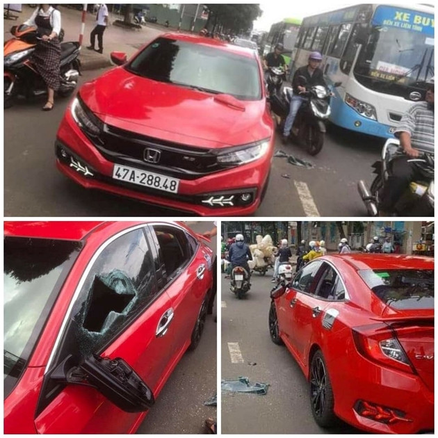 Chiếc xe con bị thầy chùa đập vỡ kính.