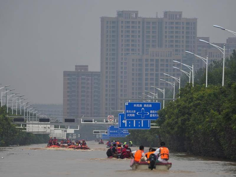 Trạm Thủy văn Bắc Kinh thông báo, thủ đô của Trung Quốc đã ghi nhận lượng mưa lớn chưa từng thấy trong 140 năm qua. Ảnh: AP.