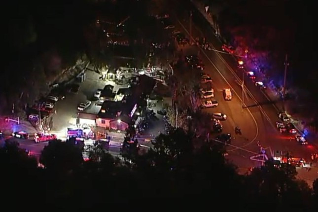 Cai nhau voi vo, cuu canh sat My ban thuong vong 8 nguoi