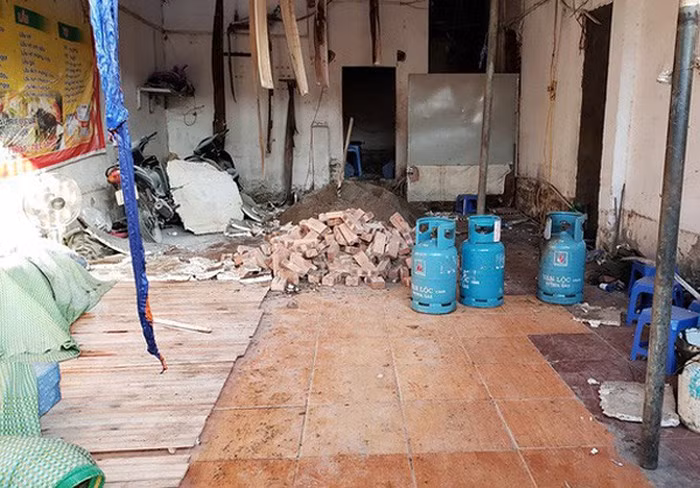 Danh tinh nguoi dan ong xa khi gas dinh dot nha o Ha Noi-Hinh-2