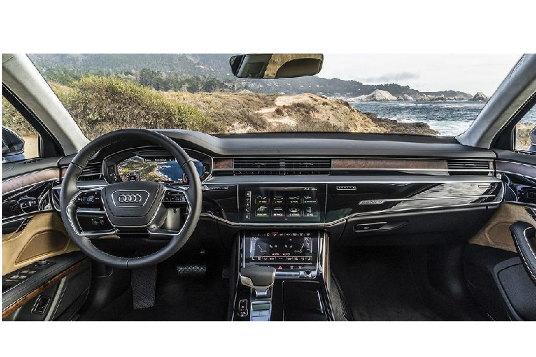 Audi A8L Khoang lái của Audi A8 mới là một nơi đáng để bỏ thời gian thưởng thức, nhưng điều làm người ta hứng thú nhất là các công nghệ. Bảng đồng hồ của xe là dạng kỹ thuật số hoàn toàn, và mặt táp lô có bao gồm 2 màn hình cảm ứng lớn để điều khiển tất cả mọi thứ. Phiên bản xe cao cấp thậm chí còn có một chiếc máy tính bảng có thể tháo ra ở ghế sau.