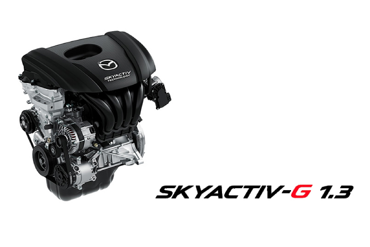 Phiên bản máy xăng sử dụng cơ 4cyl dung tích 1.3L hút khí tự nhiên Skyactiv-G cho công suất tối đa 93 mã lực tại 5.800 vòng/phút, và mô-men xoắn cực đại 123Nm đạt được từ 4.000 v/phút. Sử dụng kết hợp với hộp số tự động 6 cấp (6 AT) đi cùng với hệ dẫn động cầu trước (FWD).