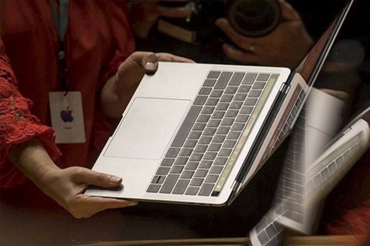 Viet Nam chinh thuc cam mang Macbook Pro len may bay