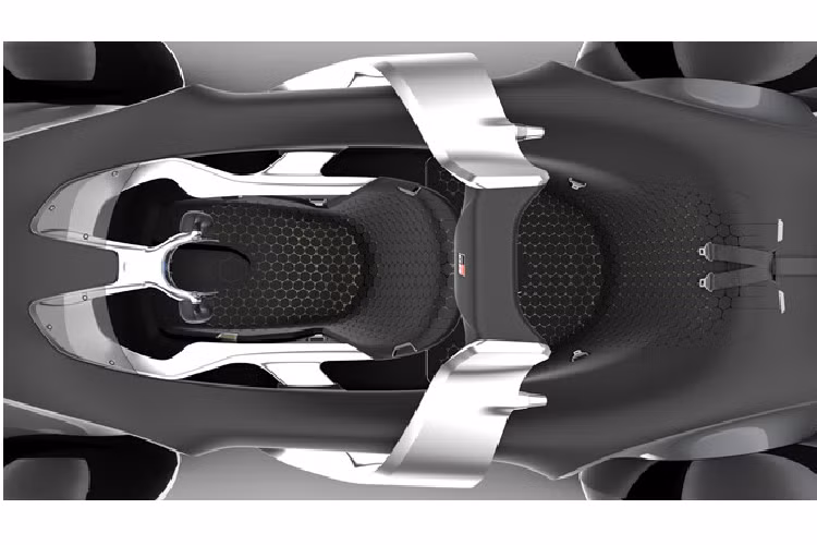 Tài xế ngồi ở giữa xe, trước mặt là vô lăng và hệ thống kính kỹ thuật số đặc biệt. Xe có hai ghế ngồi, trước và sau.